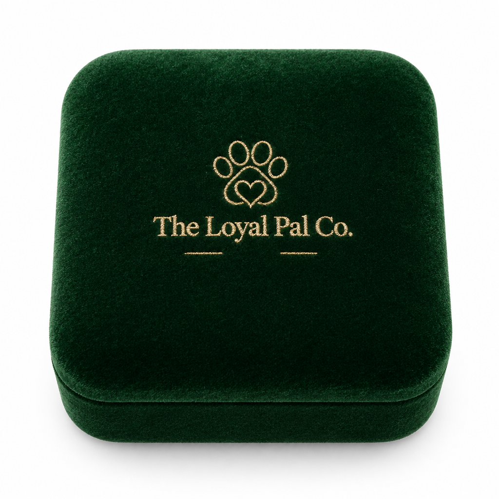 The signature forest green velvet keepsake box embossed with The Loyal Pal Co. logo