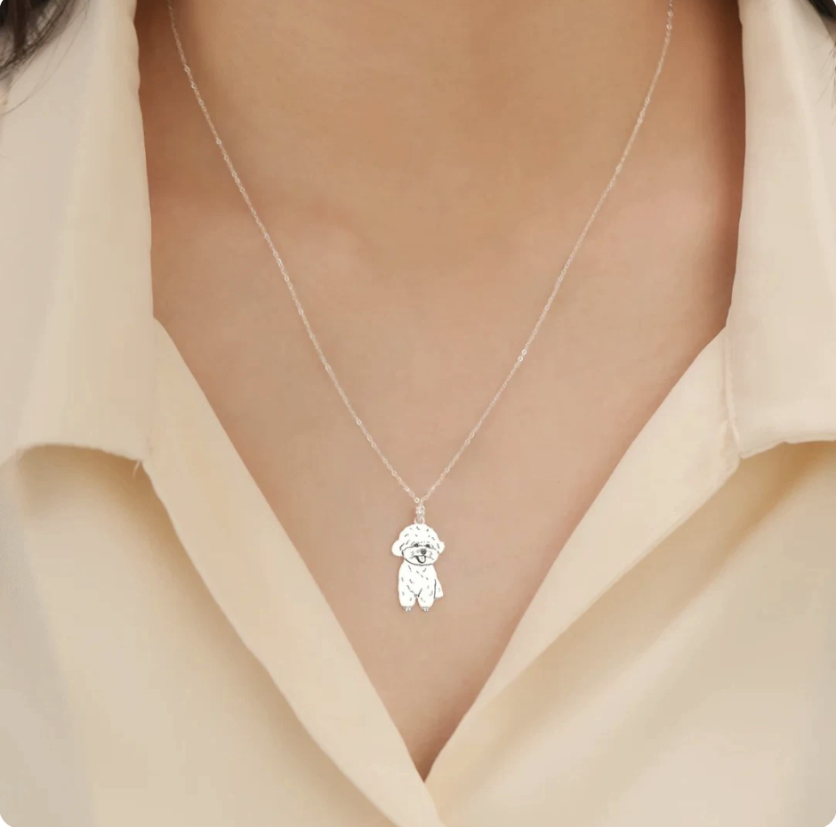 The pet portrait necklace worn close to the heart